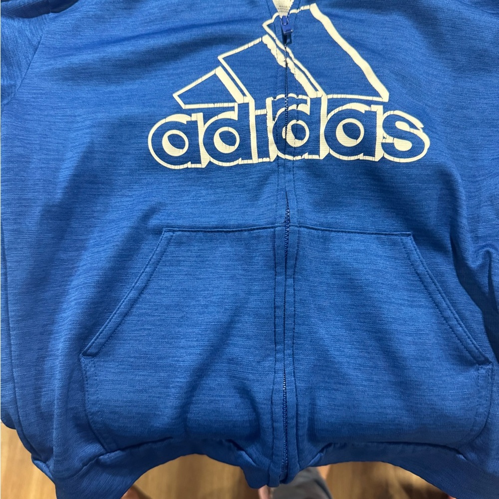 Two kids Adidas track suits